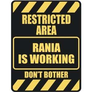   RESTRICTED AREA RANIA IS WORKING  PARKING SIGN