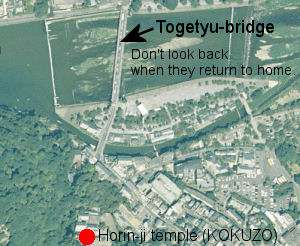 There is Togetsu bridge over Katsura river between the town and KOKUZO 