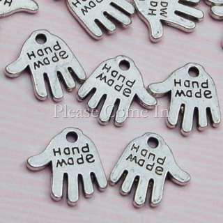   hand palm shaped with the word Handmade printed on the bead charm