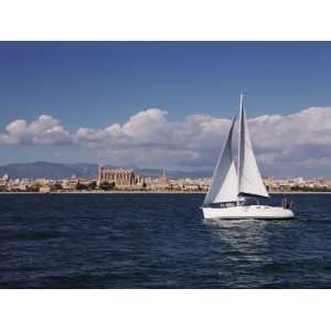 Yacht in Palma Bay Looking Back to La Seu Cathedral, Balearic Islands 