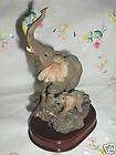 MOTHER AND BABY ELEPHANT FIGURINE 7 1/2