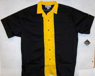   front and is solid BLACK with a GOLD Collar, and a GOLD front