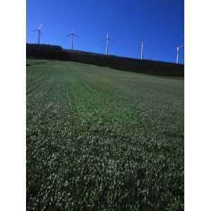  Wind Turbines Along a Ridge with Green Field Stretched 