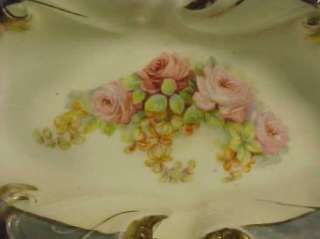 This is a lovely K&L Bavaria Oval Molded Bowl decorated with roses 