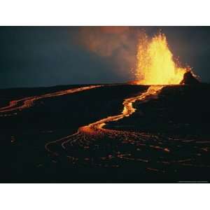 Blazing Fountain and a River of Lava Pour from a Vent of the Volcano 