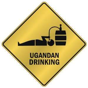    UGANDAN DRINKING  CROSSING SIGN COUNTRY UGANDA