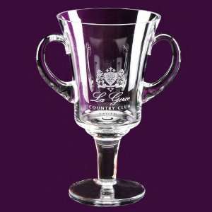   in the shape of the classic loving cup. Deep etched.