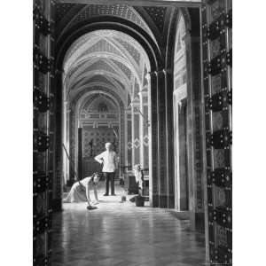  Servants Cleaning Floor of Hallway Inside the Palazzo 