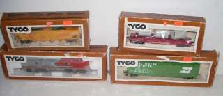 This is a Vintage 1975 HO Tyco Lot, consisting of an Engine & Three 