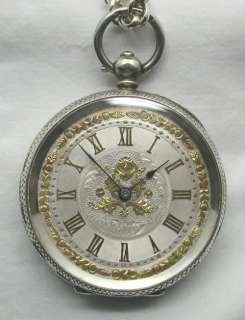   FANCY SILVER POCKET WATCH WITH GOLD & SILVER DIAL CHAIN & KEY  