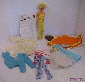 Lot of 23 Barbie clothes and accessories with dated 1966 Barbie Doll 