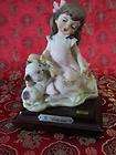   FIGURINE LITTLE GIRL ON PHONE #0364P (GIRL WITH PHONE TO CATS EAR