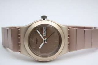 New Swatch Irony Silky Lustre Aluminum Rose Gold Tone Women Date Watch 