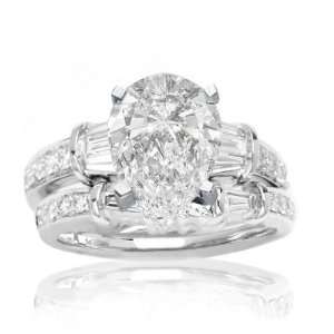  0.94 Carat Baguette And Round Diamonds Engagement Ring 