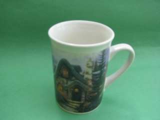 You are bidding on a darling Thomas Kinkade mug. The picture goes 