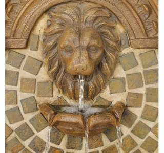 This classically styled fountain features a lions head and three 
