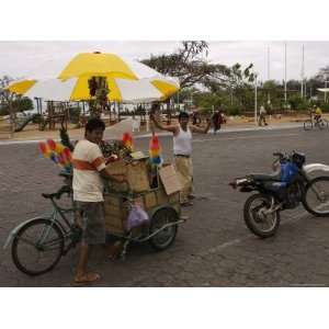  Street Vendors Hawking Goods from Carts on an Island 