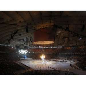  Olympic Flame is Lit During the Opening Ceremony for the 