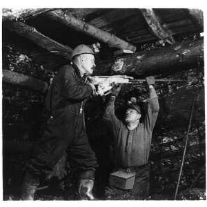   in a coal mine,Hazelton,PA,Drilling with jackhammer