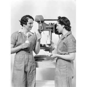  Two Women Workers Standing Near Drill Press, Eating Sandwich 