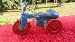   OLD BLUE & RED, ALL METAL WIND UP TRICYCLE, GOOD WORKING COND.  