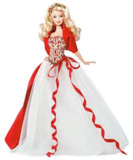   this collectors Holiday Barbie features a dazzling level of detail